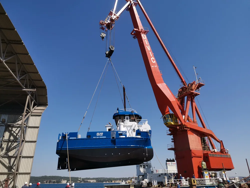 Fish farm service vessel – catamaran